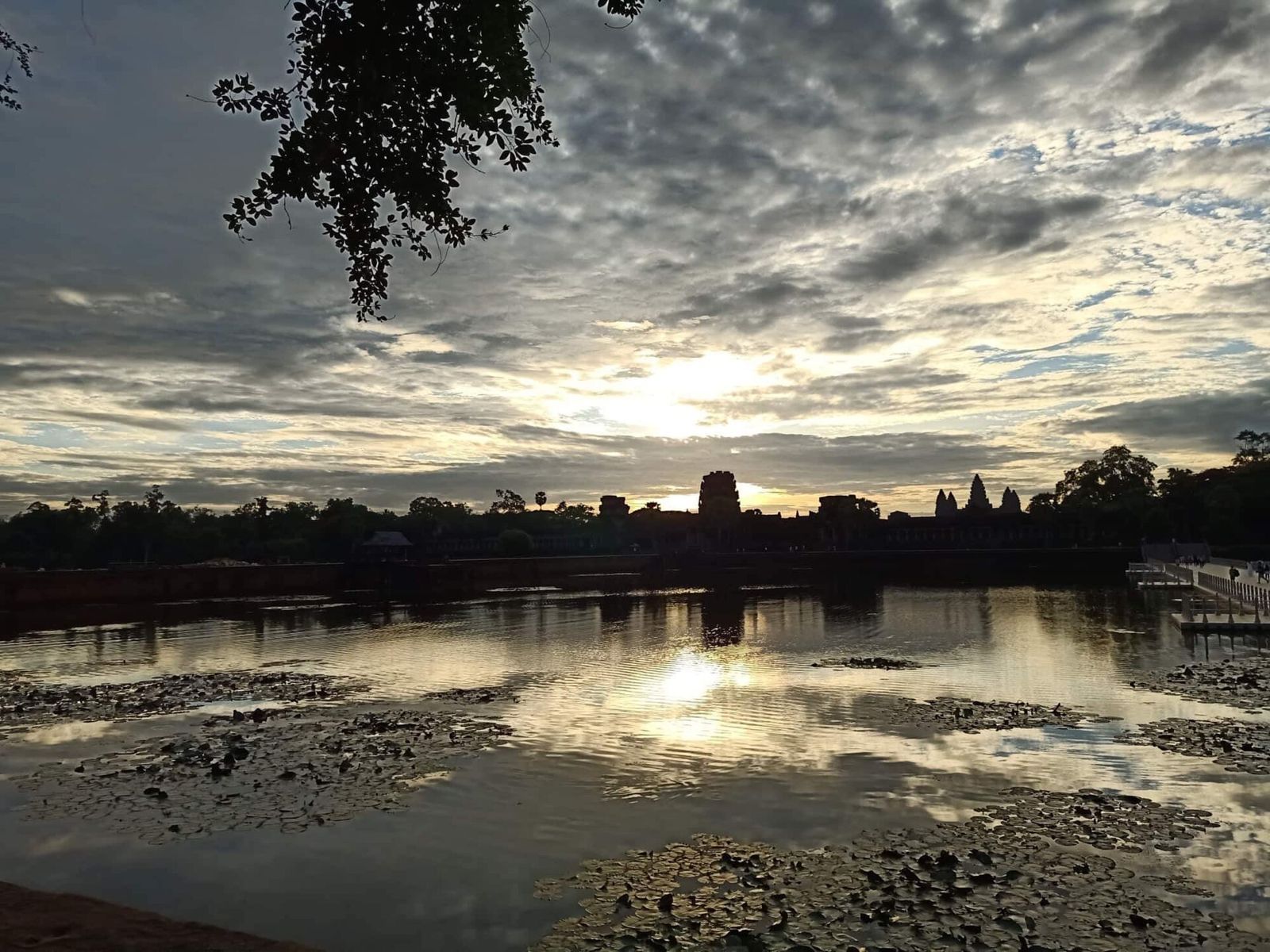 A sweeping panorama of the Angkor Wat (pre-) sunrise scene from the street leading to the temple. This is in August 2019- picture sent by my friend in Siem Reap- the pink, purple and lavender hues of 